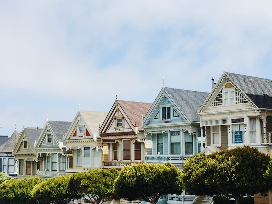 Iconic Painted Ladies Victorian houses in San Francisco with clear blue skies